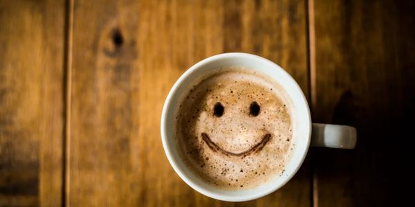 Happy face coffee cup design