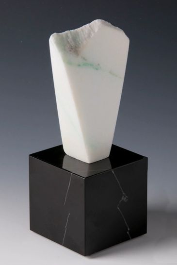 CO Yule Marble sculpture. four-sided polished, top edge is rough