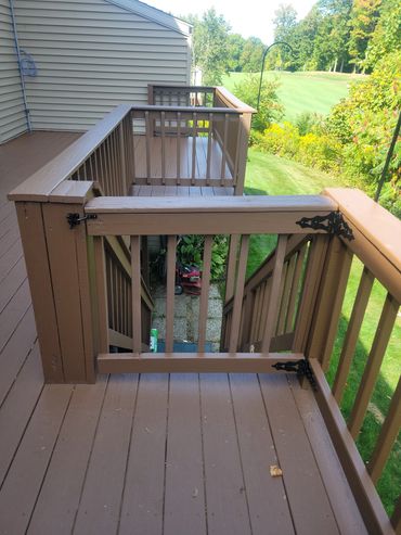 Hardware was removed, deck was pressure washed and painted and the hardware was refinished and reins