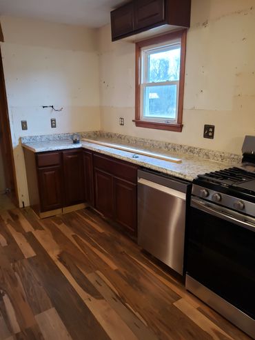 We installed appliances cabinets and countertop.