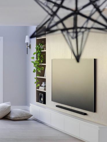 Custom coastal Entertainment unit. Oak display shelves with clean lined finger-pull drawers.