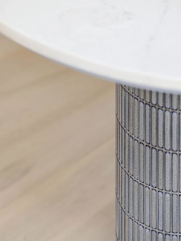 Curved Island bench detail with feature blue tile and oak flooring