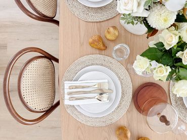 Bentwood dining chairs with rattan inlay, oak dining table. Fresh Flowers