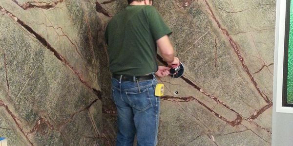 Mobility Bath Systems installing a shower wall surround during their shower conversions project.