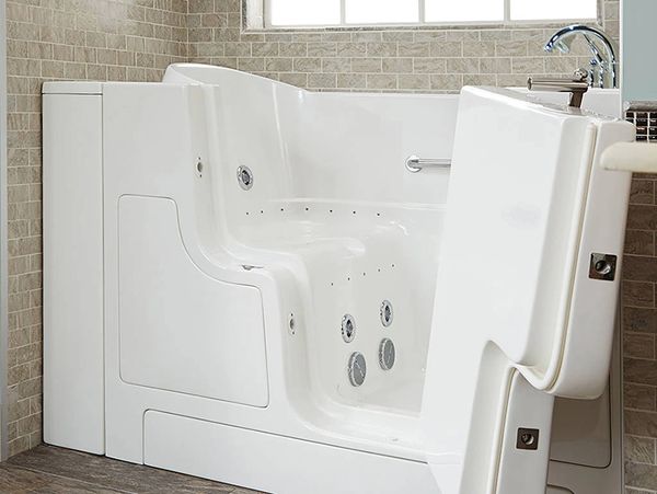 A safe step-in transfer walk in bathtub for more accessibility of seniors with mobility issues.