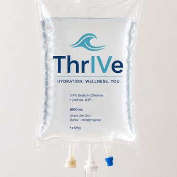 Intravenous saline hydration bag labeled ThrIVe for wellness and hydration.