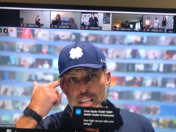 Virtual UPW Event with Anthony Robbins: Capturing a Moment with Robbins on Screen.
