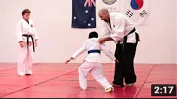 boy doing self-defence