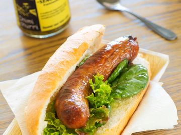 Choripan with chimichurry catering. charcoal grill chorizo