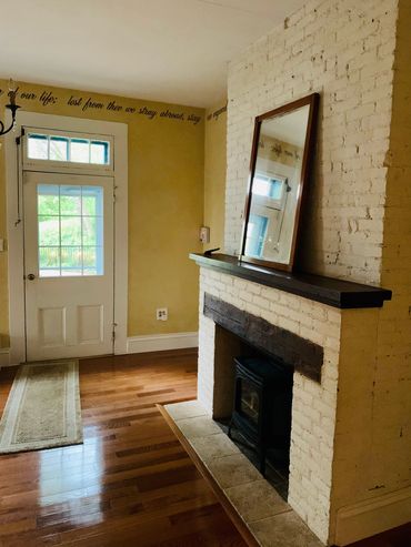 Original fireplace in the kitchen.