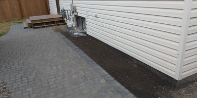 final product after foundation repair, weeping tile, backfilling and cleanup