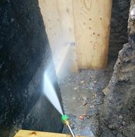cleaning foundation wall for waterproofing