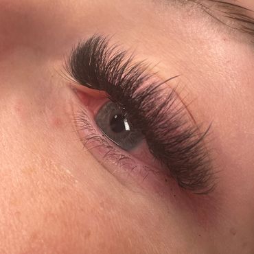 Close up image of a clients lashes from Instagram of a 12D Cloud set using the double layered fans.