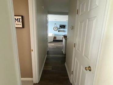 Hallway to bedrooms, bathroom and washer dryer