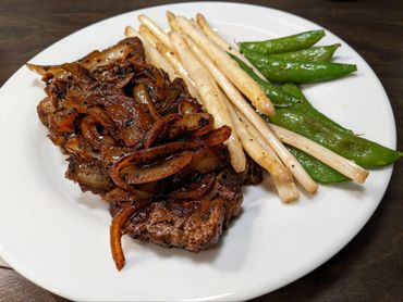 Onion Glazed Steak with white and green vegetables