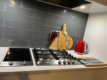 Best Brand Kitchen essentials are Miele Induction/Gas cook top + Smeg Kettle+ Resin Charcuterie Boar