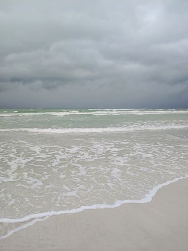 brant-crockett-lido-beach-dark-clouds-overhead