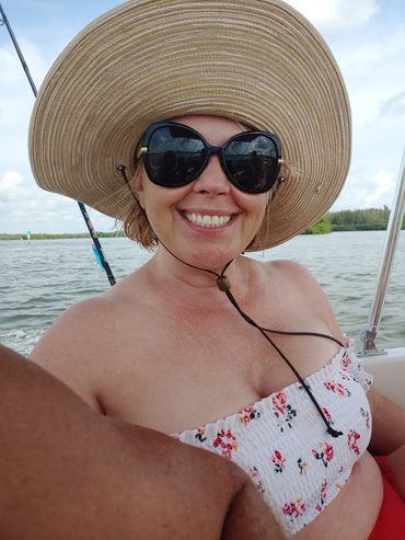 sandra-smiling-at-brant-crockett-on-boat-ride-sarasota-bay