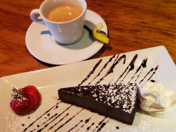 Espresso and Flourless Chocolate Ganache Slice of Cake. 