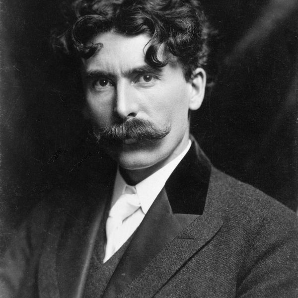 Black and white portrait of a man with thick mustache.