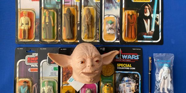 group of kenner Star Wars action figures and Yoda hand puppet prototype