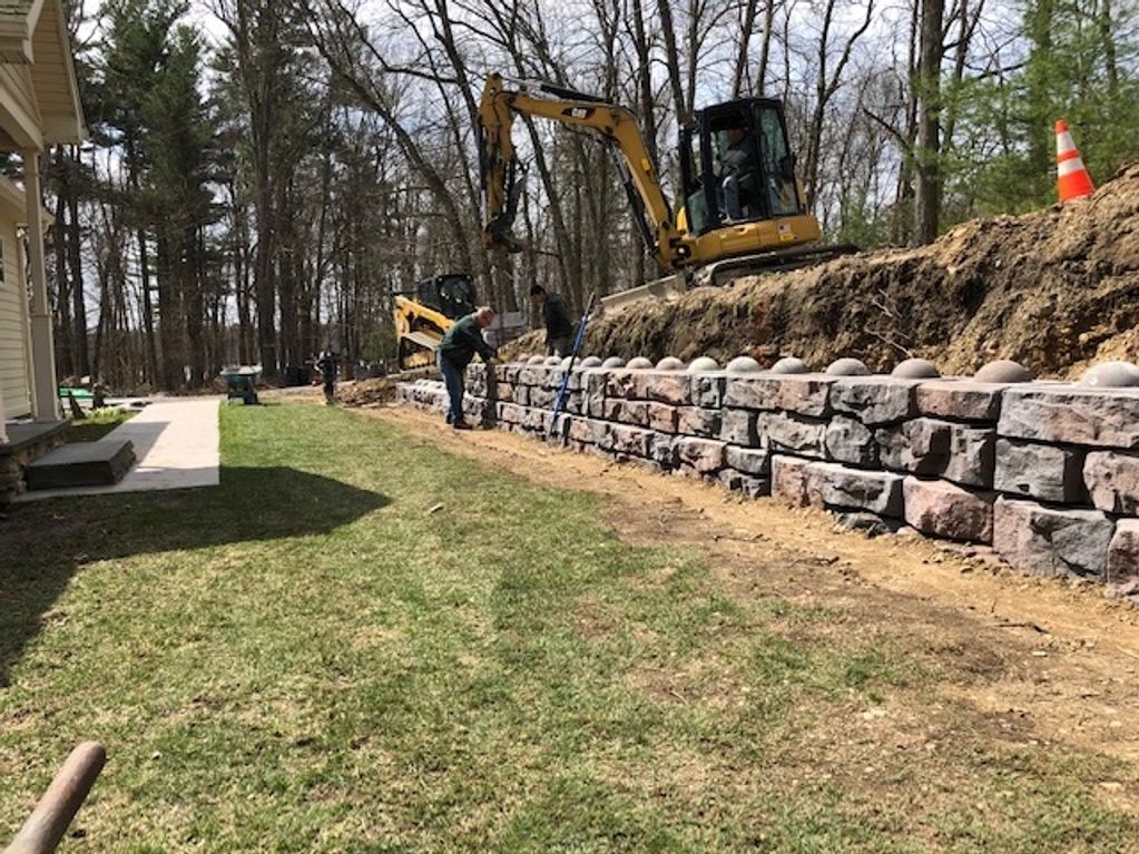 stone wall being built