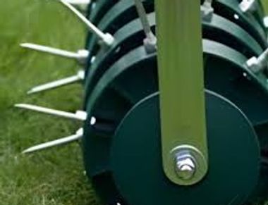 "An aerating tool used to ensure lawns have drainage"