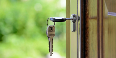 Key in the door, symbolising the fresh start with our professional end of tenancy cleaning service.