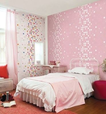 Soft pink-themed room with floral wallpaper and white furniture