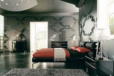 Black and white mural wall in a modern bedroom setup