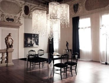 Vintage dining setup with a bohemian chandelier
