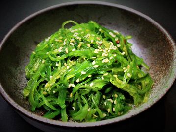 Marinated seaweed tossed with roasted sesame seed and sesame oil 