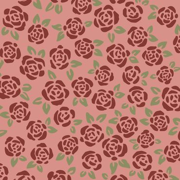 Vintage burgundy rosebuds with green leaves close together and tossed on a dusty pink background.