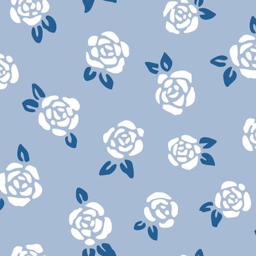 Vintage white rosebuds with dark blue leaves loosely tossed on a light blue background.