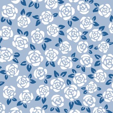 Vintage white rosebuds with dark blue leaves close together & tossed on a light blue background