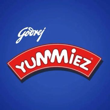 Godrej Yummiez logo on blue background.