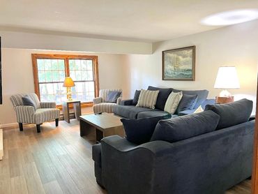 The family room features a queen sized pull out bed in the couch.