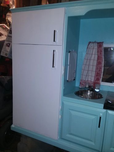 ENTERTAINMENT
CENTER TURNED
INTO A CHILDS KITCHEN