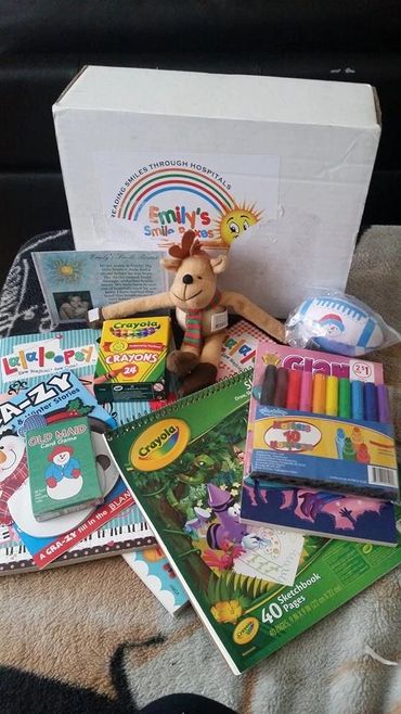 Emily Smile Box full of activities for pediatric patients during hospital visits. 