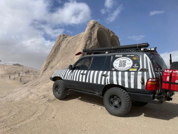 a truck with black and white stripe lines