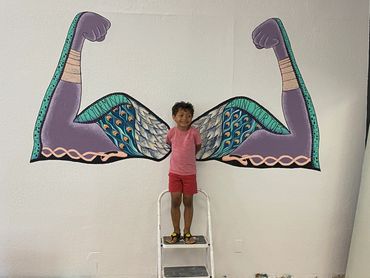 Flex your muscles point your toes mural at FLEX Performing Arts