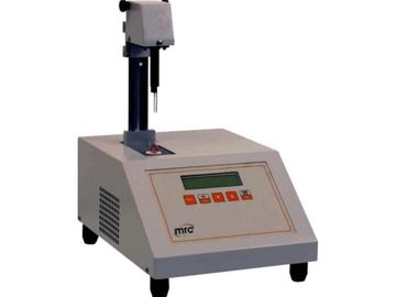 A specialized device used in dairy laboratories to analyze the composition and quality of milk.