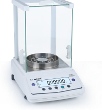 A precision electronic balance scale with a protective glass enclosure.