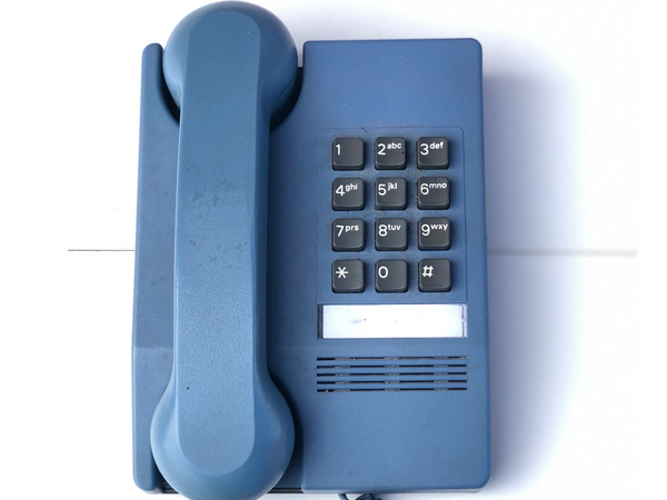 A blue northern electric touch tone. Was produced in 1990