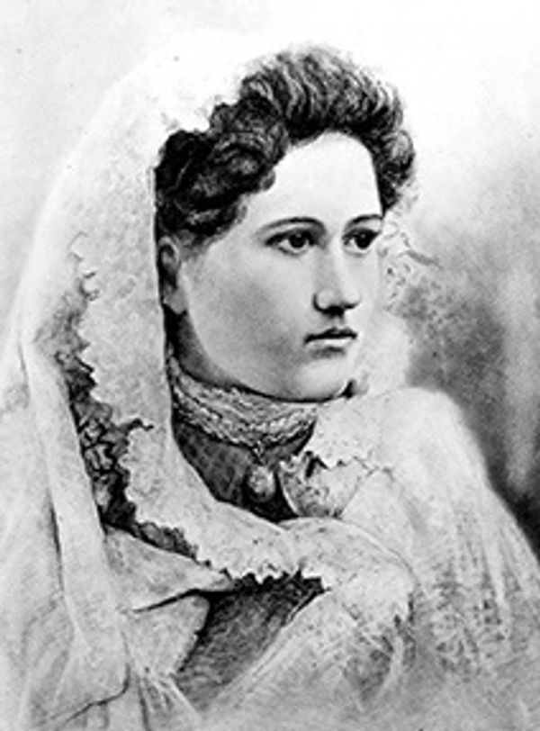 Ida Cates Sitting for a portrait photograph.