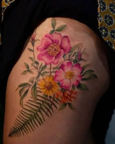 Beautiful color, realism, flowers, and a fern on a thigh