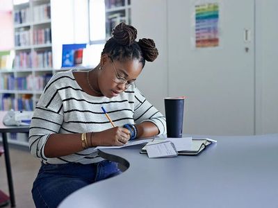 A high school student studying for an exam.