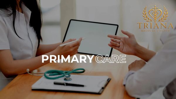 Doctor and patient discussing care with tablet, stethoscope on table.