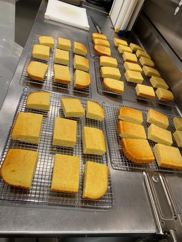 Mission Belly Full meals being prepared for donation. Baked bread.