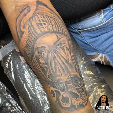 Arm skull tattoo done by Eric Delshun at Indigo Tattoo Shop in Memphis Tn